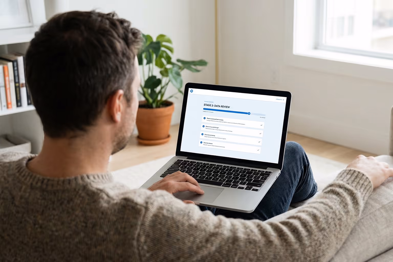 blog-homeowner-relaxed-couch-laptop
